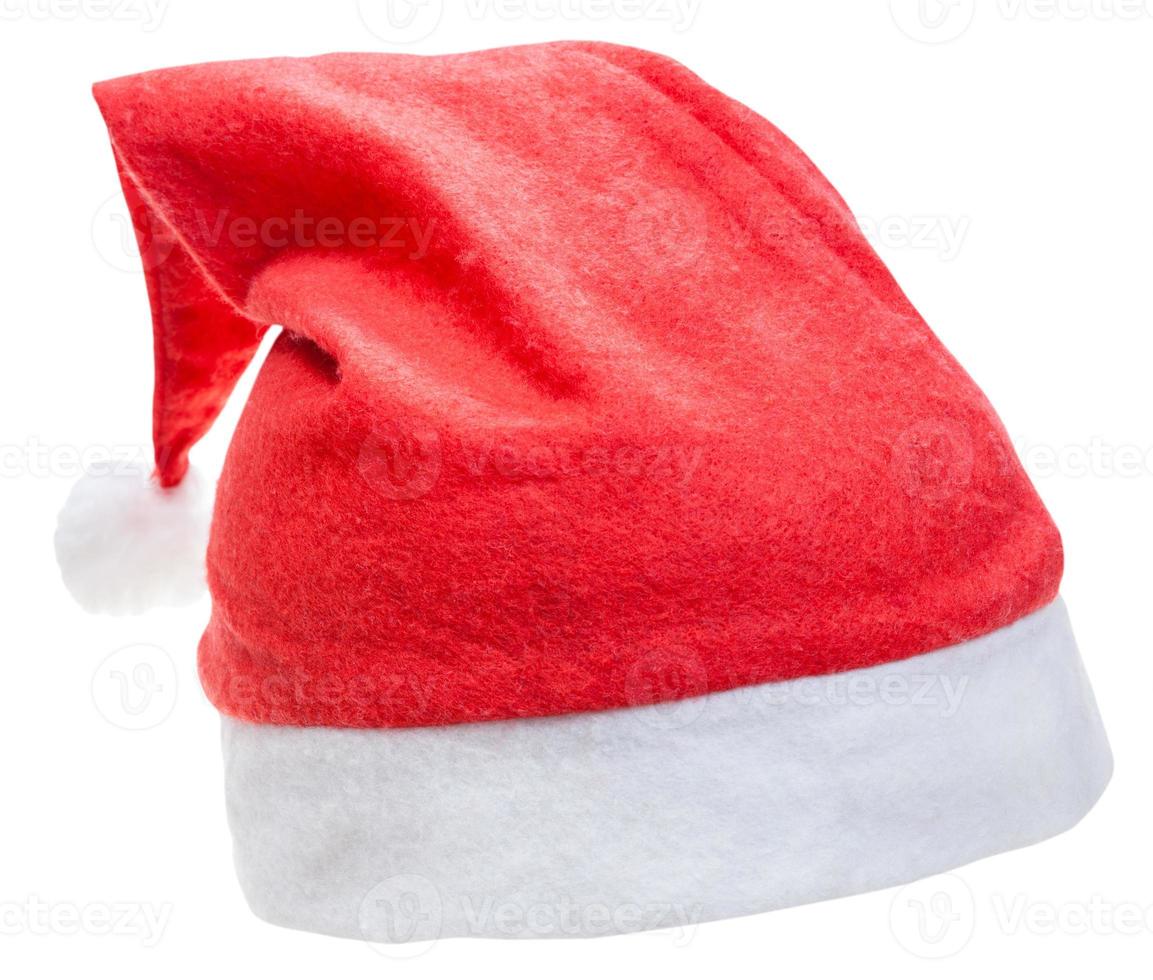 typical red santa claus hat isolated on white photo