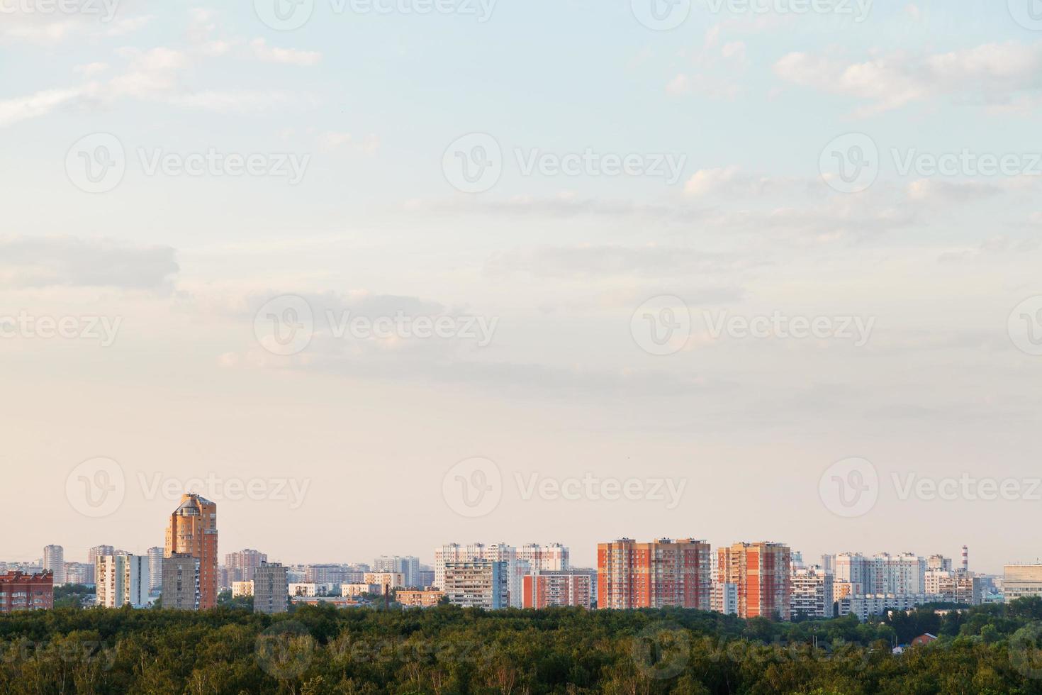 pink sunset over city street photo