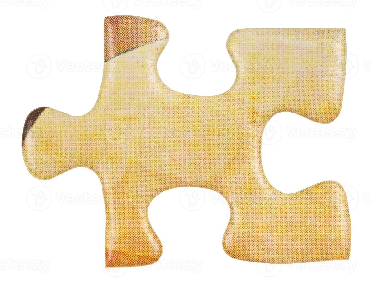 cardboard yellow piece of jigsaw puzzle close up photo