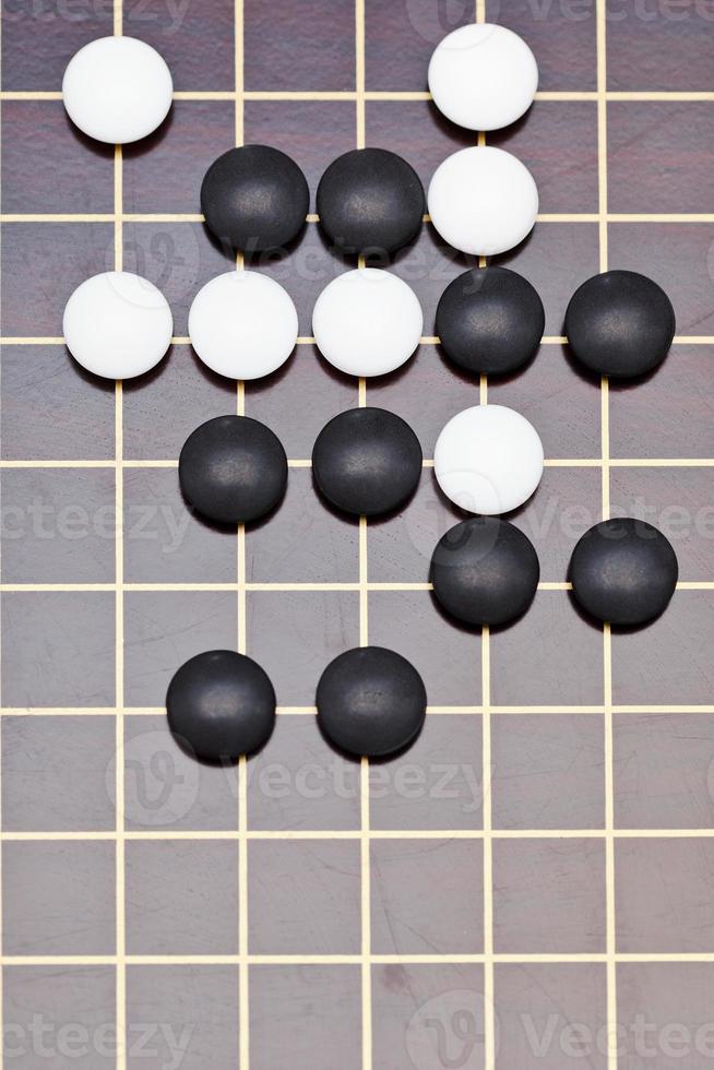 above view position of stones during go game photo