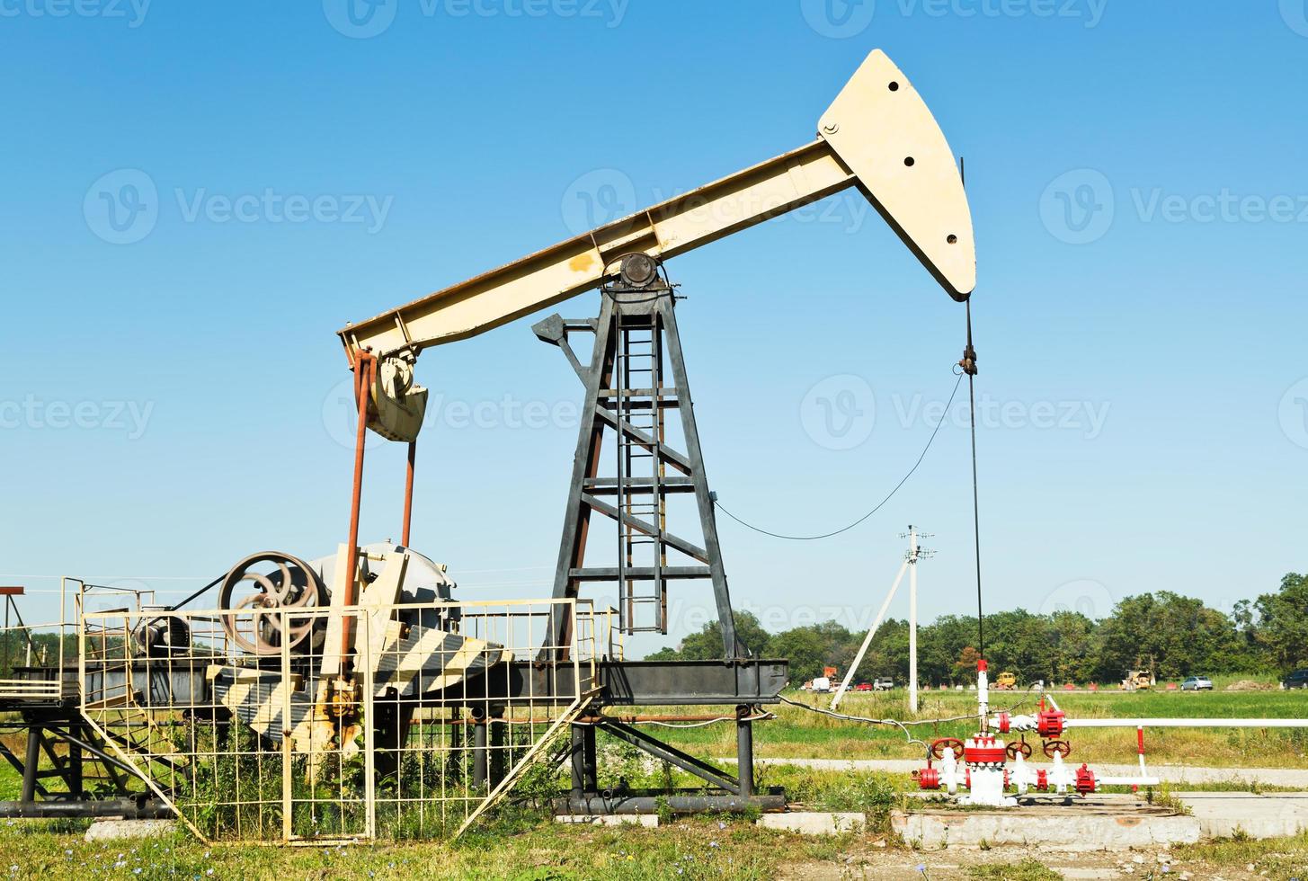 oil extraction by pumpjack in Caucasus region photo