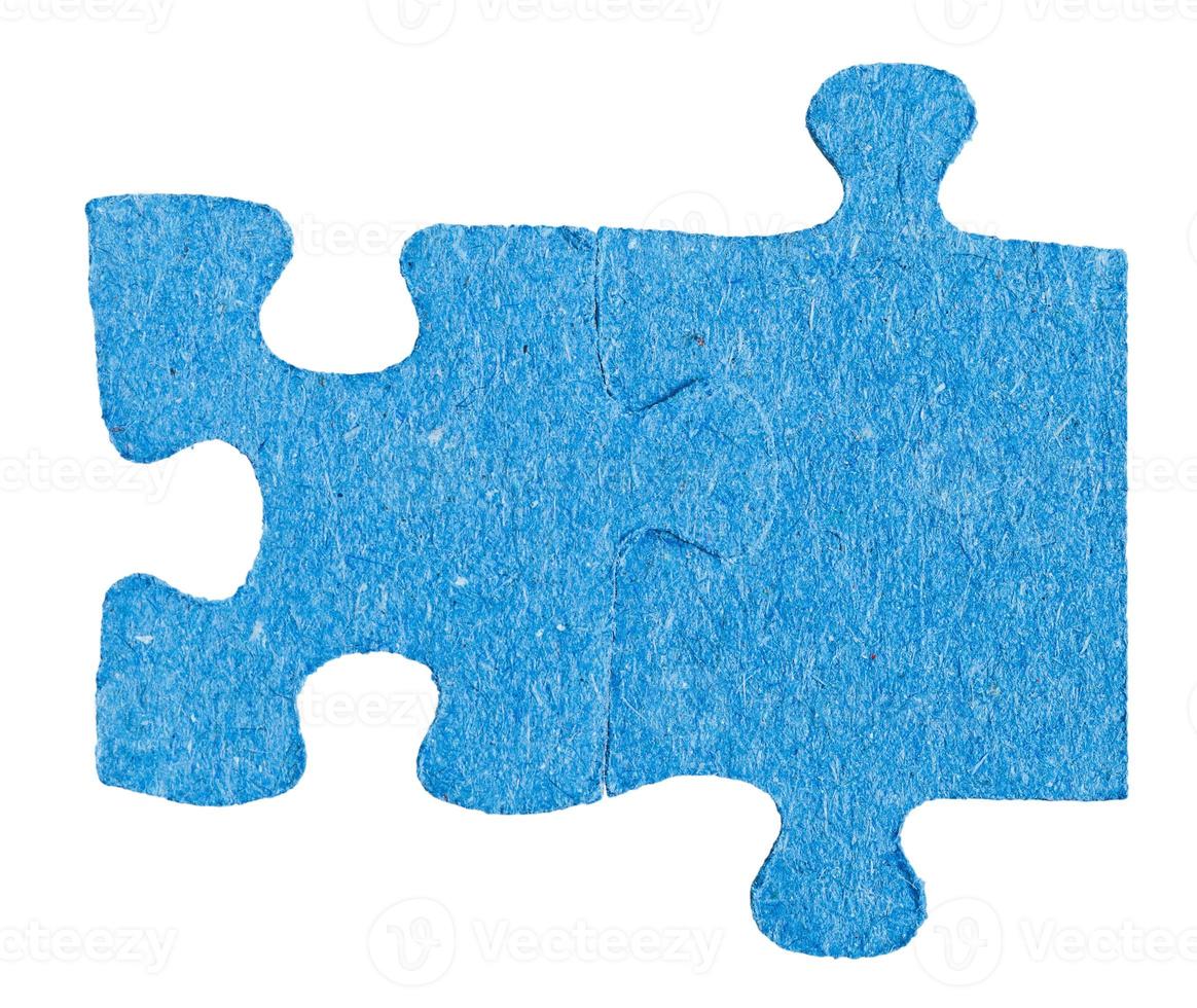 two connected jigsaw puzzle pieces photo