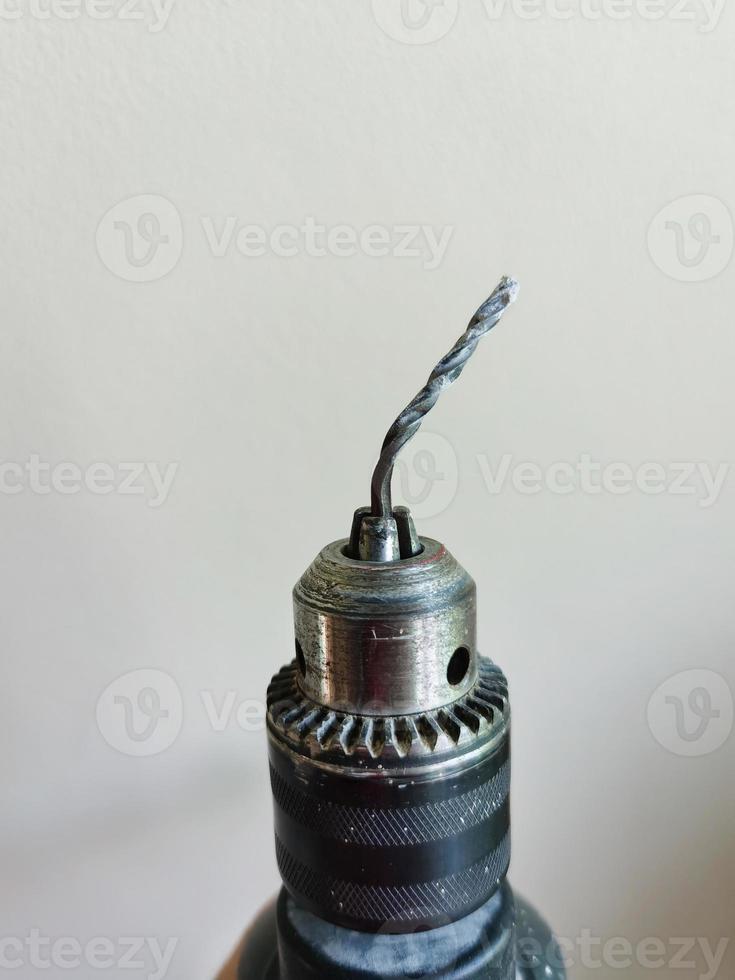 A Broken Bent Dill Bit in a Power Driver photo