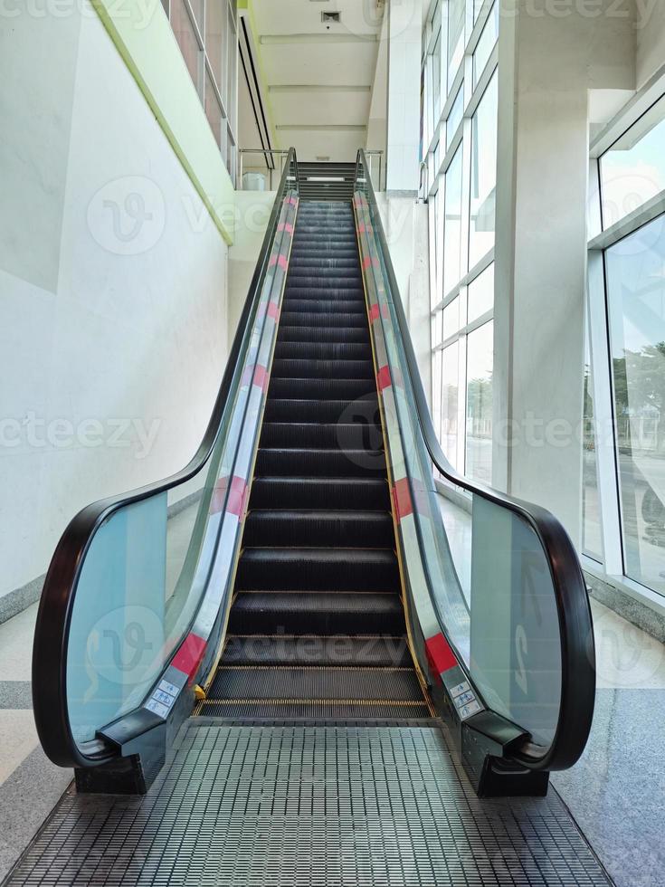 Escalator in a shopping mall photo