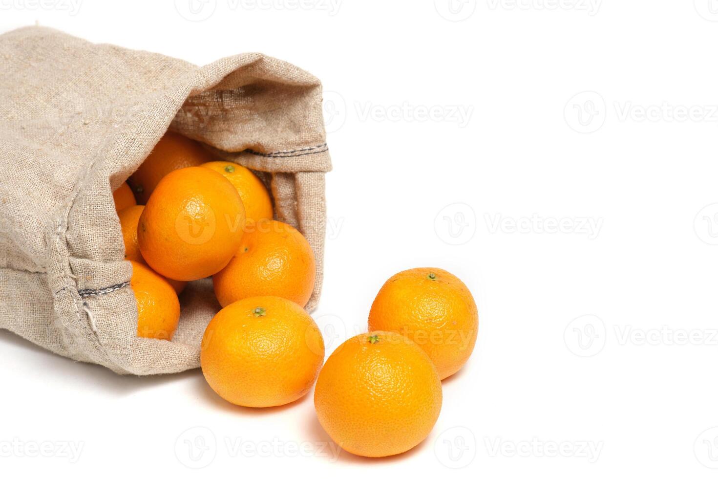 Scattered tangerines from bag on white background. 11852416 Stock Photo