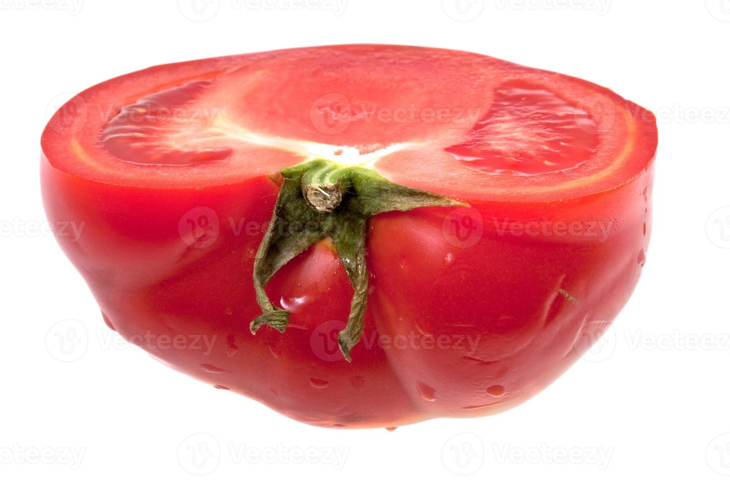 la mitad de tomate foto