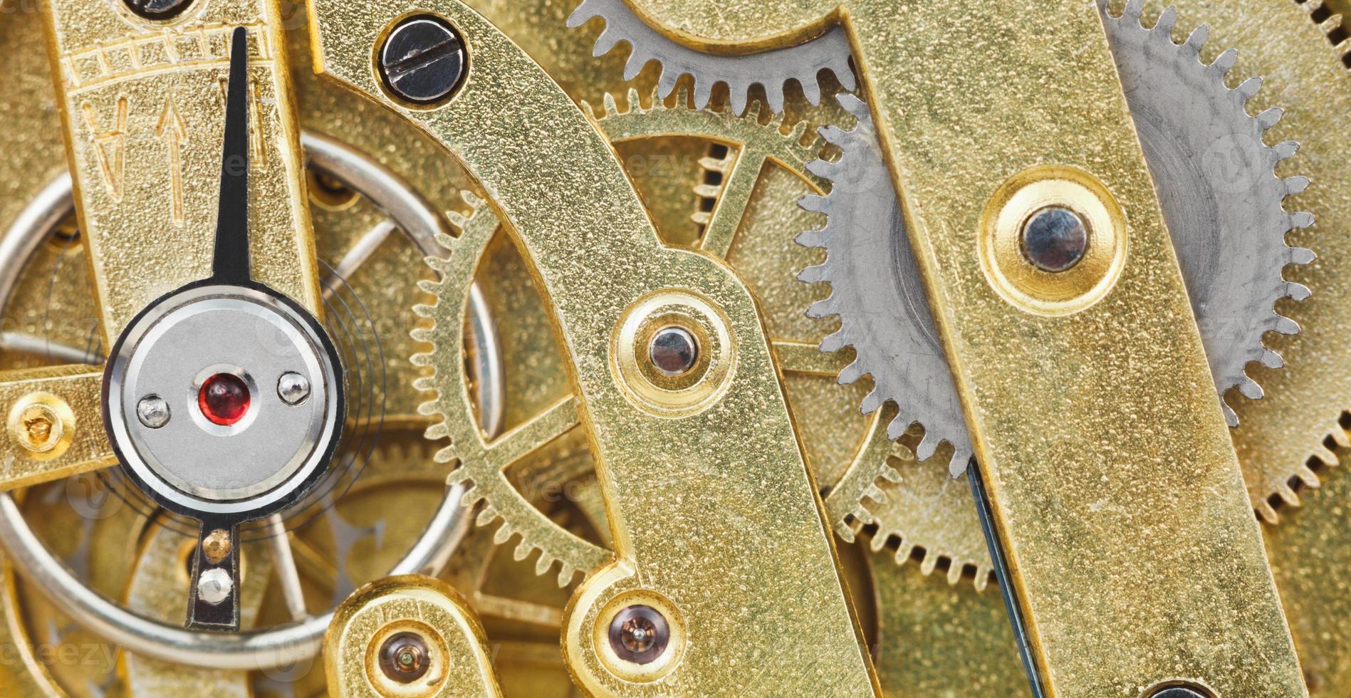 background from brass mechanical clock movement photo