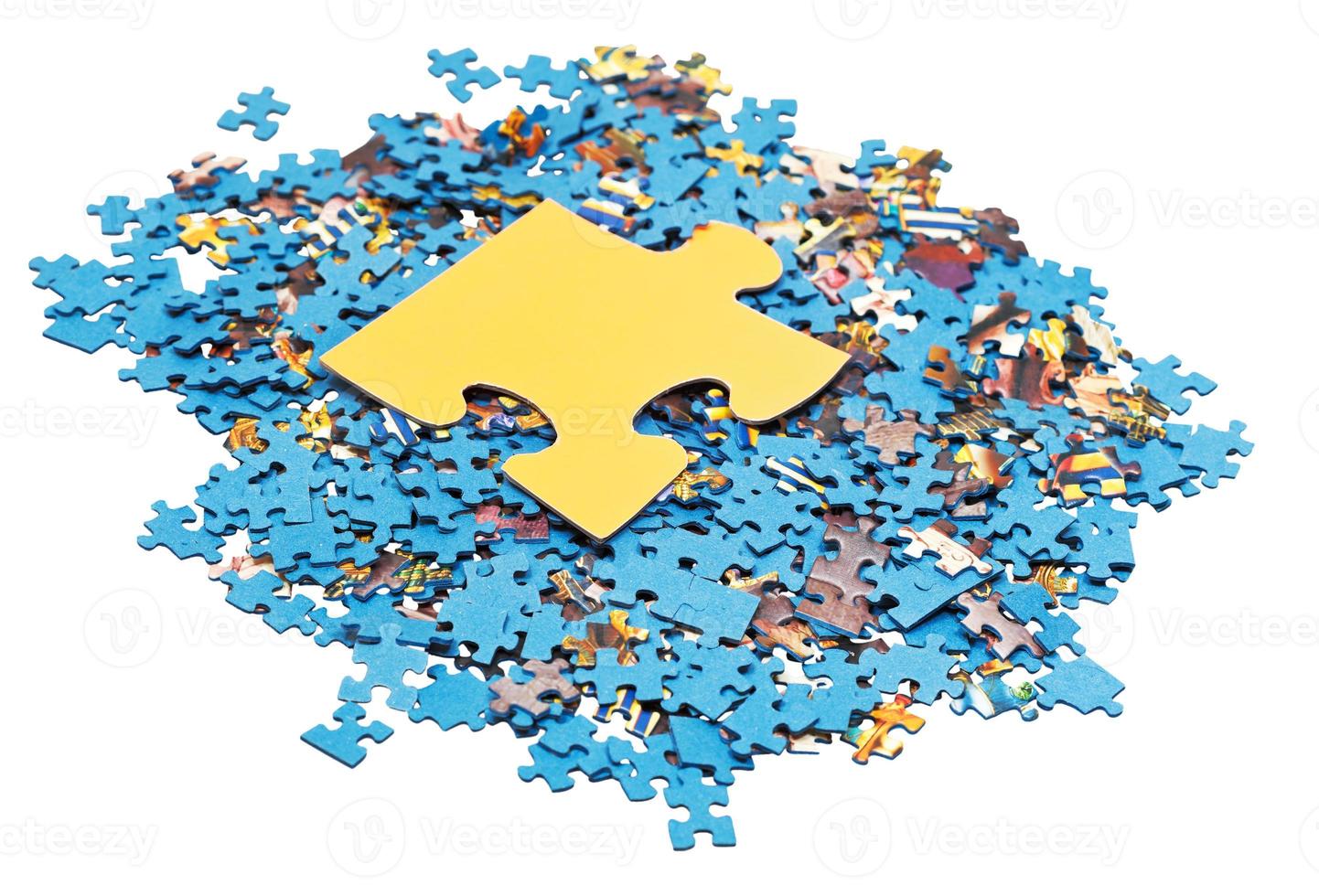 big puzzle piece on pile of disassembled puzzles 11852787 Stock Photo at Vecteezy
