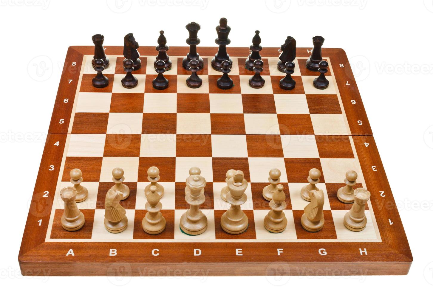 chess pieces placed on board photo