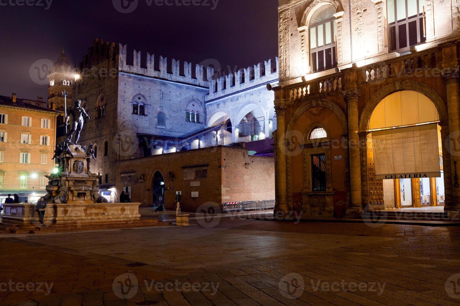 Fountain of Neptune in Bologna at night photo