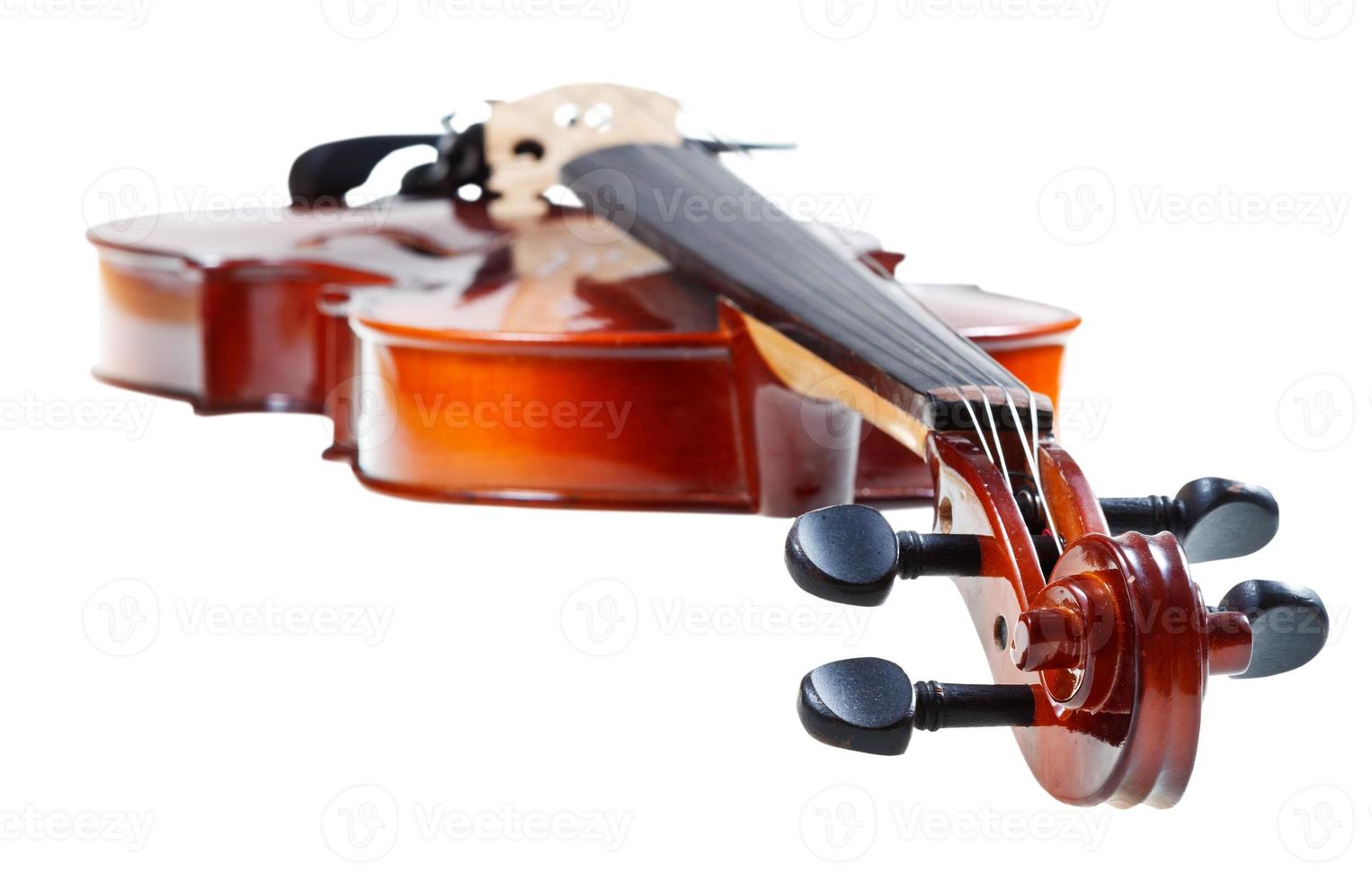 scroll of classical wooden violin close up photo