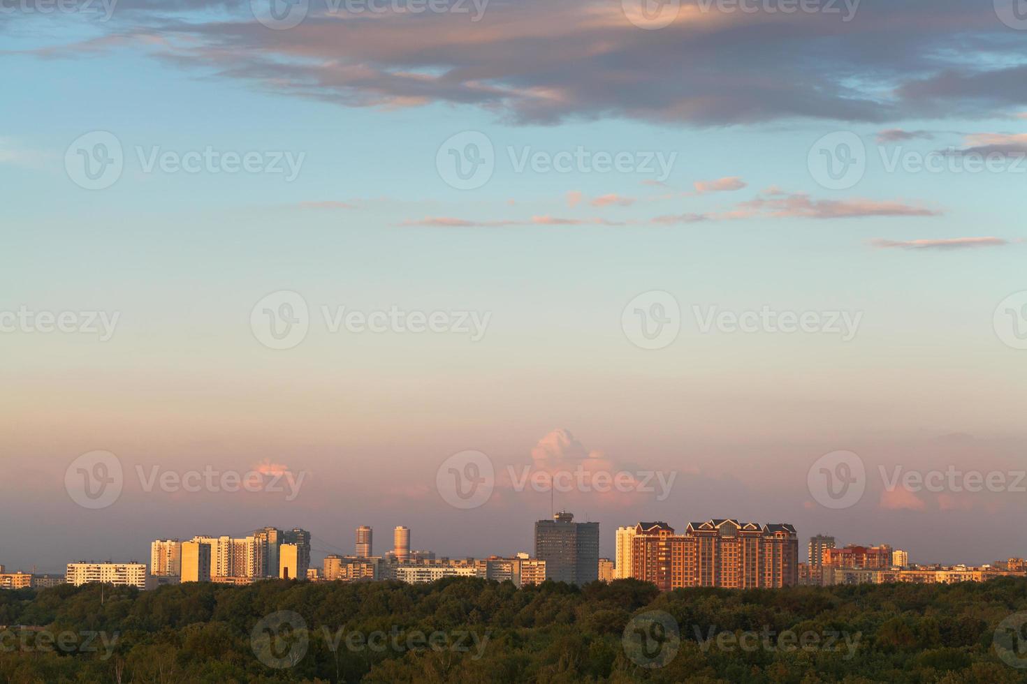 pink sunset over city photo