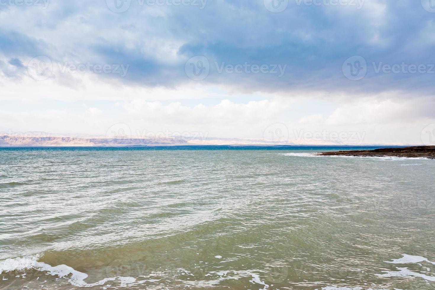 Dead Sea in cloudy day photo