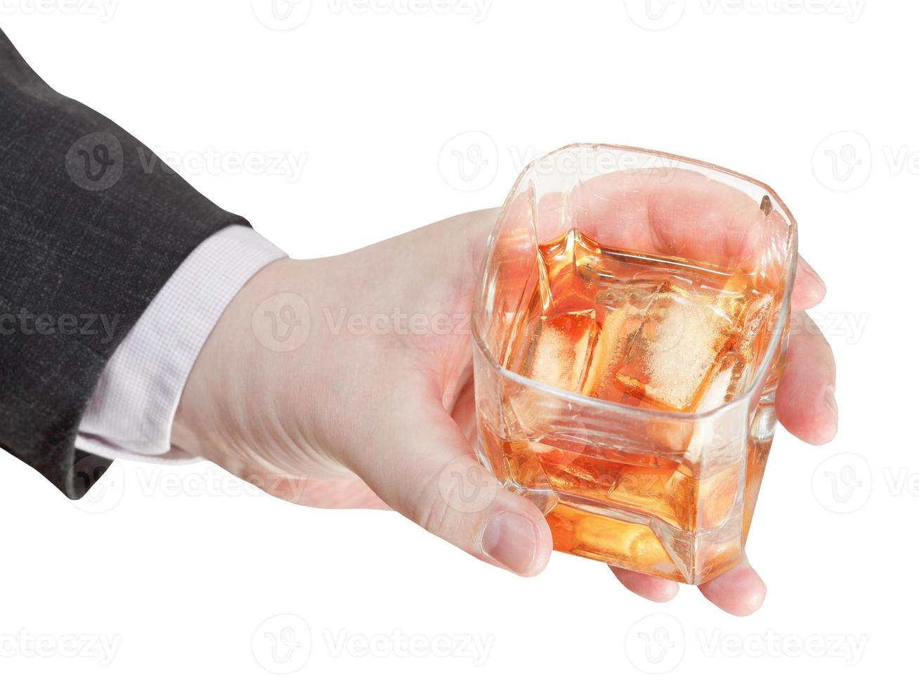 above view of whisky glass in businessman hand photo