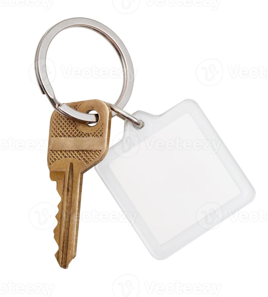 home brass key and square keychain on ring photo