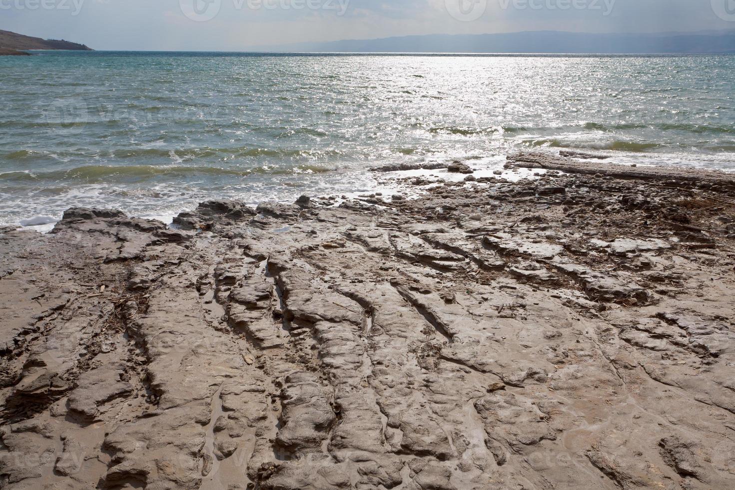 mud beach of Dead sea in Jordan photo