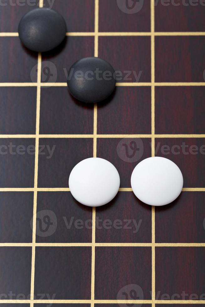 top view of few stones during go game playing photo