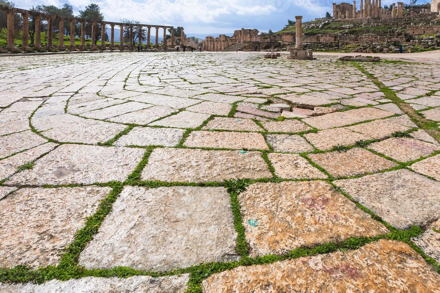 wet floor stones of Oval Forum in Jerash in winter photo