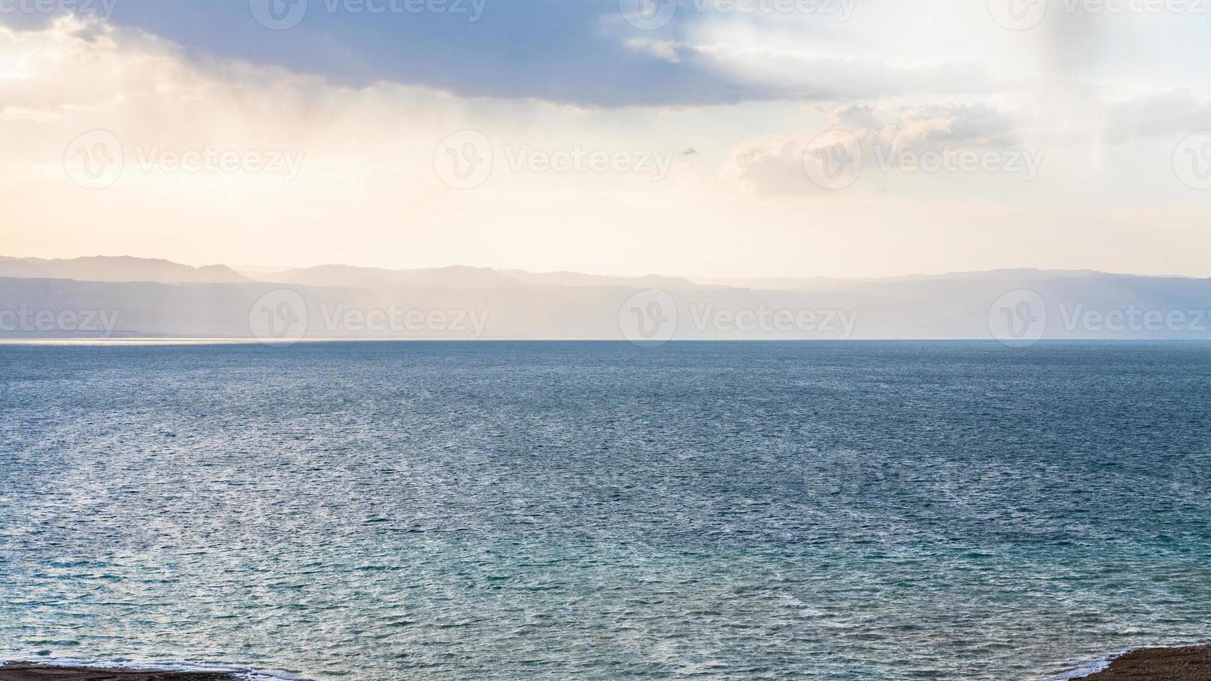 Dead Sea from Jordan shore in winter evening photo