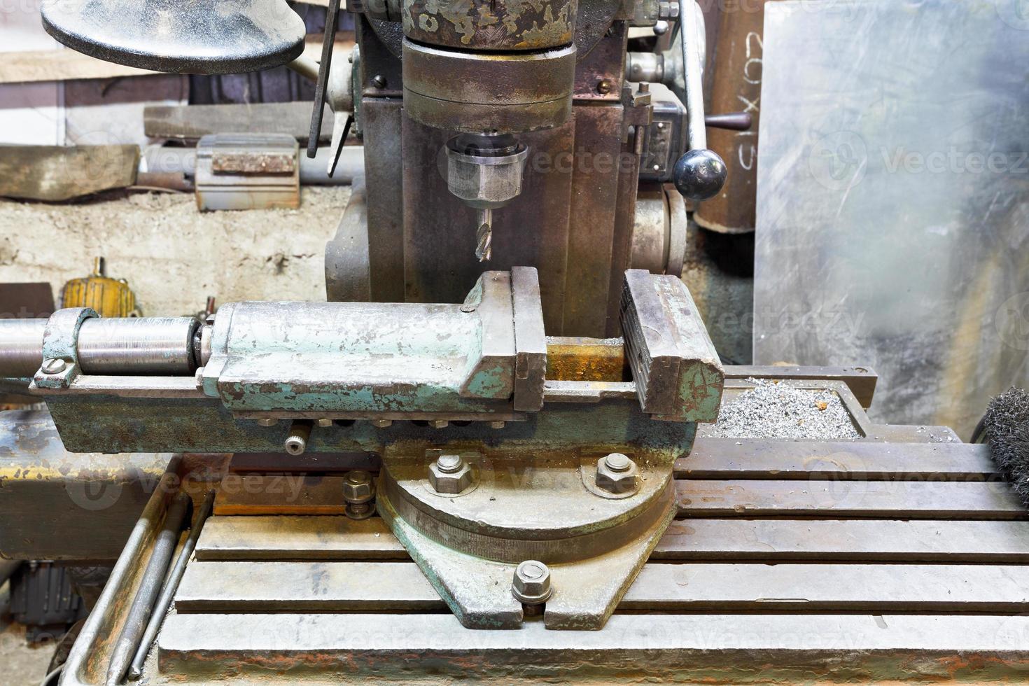 drill of old boring machine close up photo