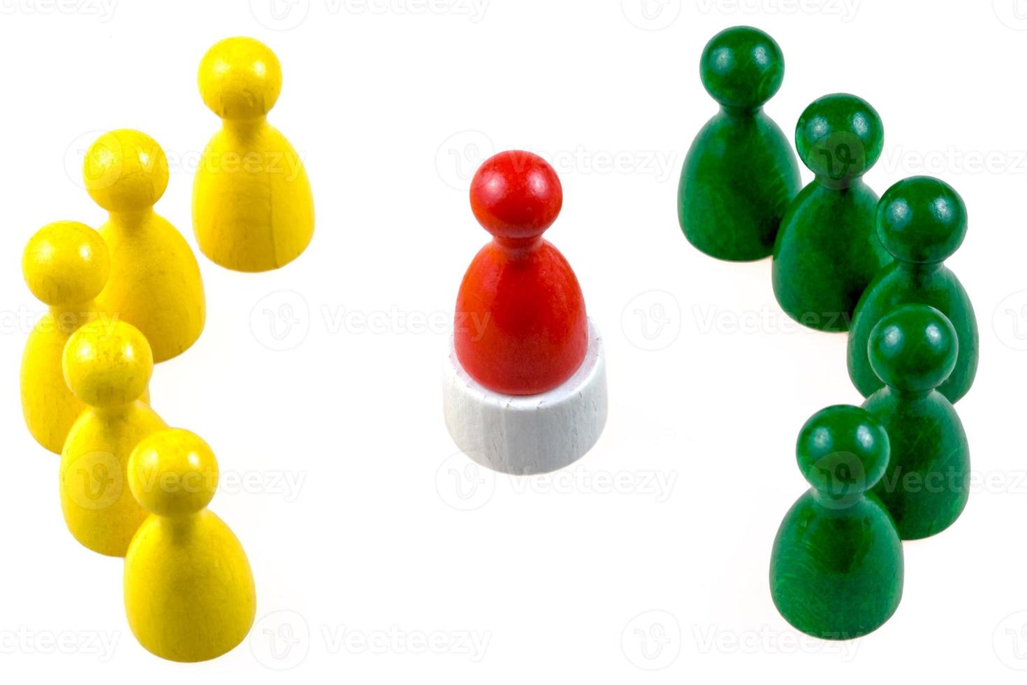 orator between people  by wooden figurines isolated photo