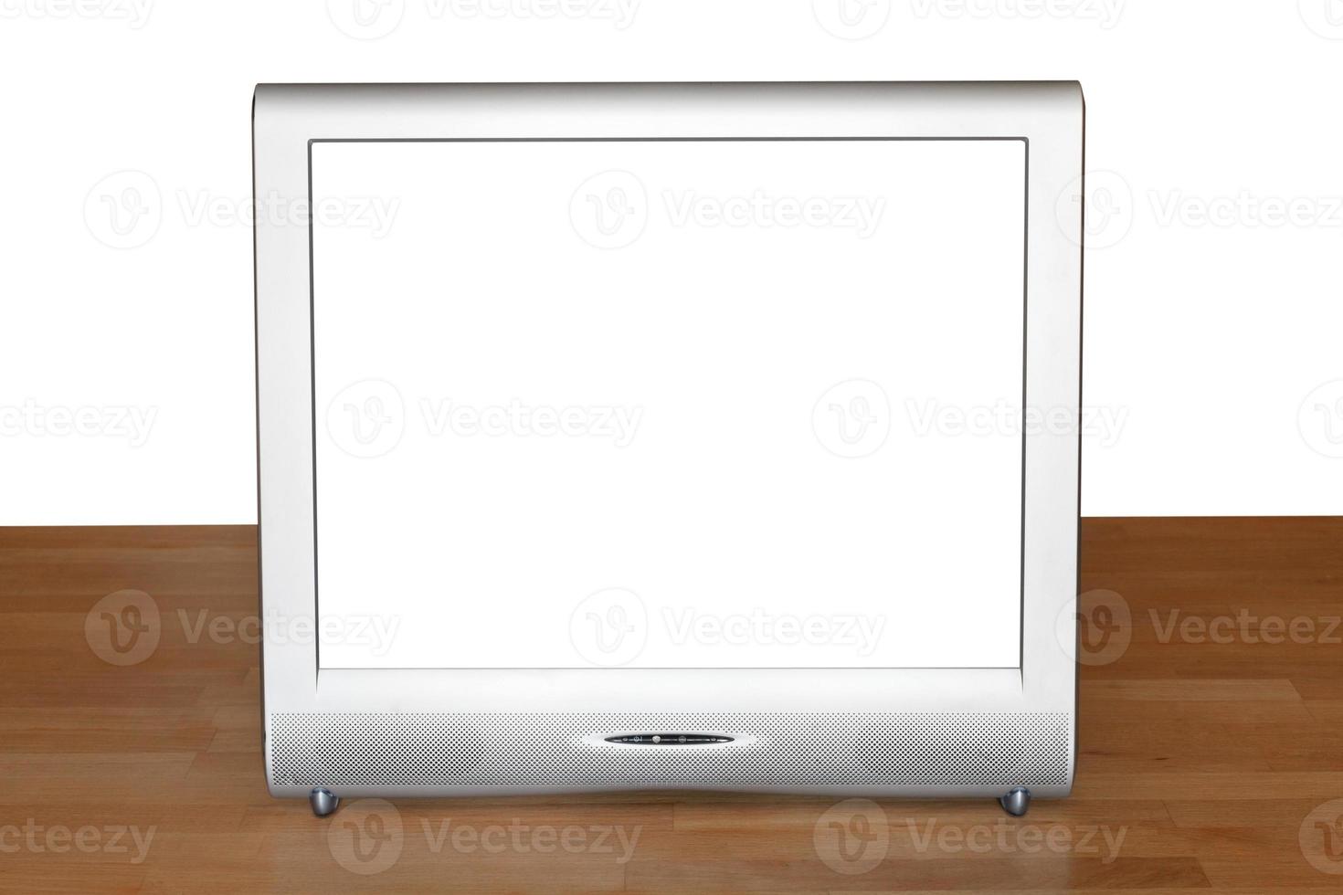 silver TV set display with cutout screen on table photo