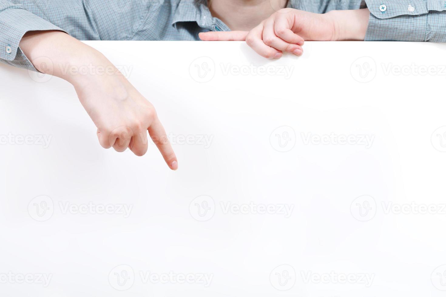 finger points on blank billboard photo