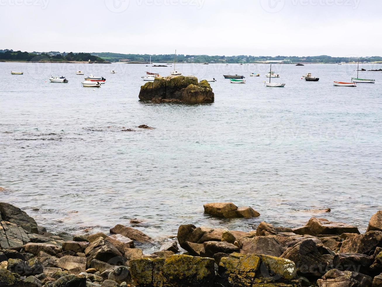 boat near beach of Gouffre gulf of English Channel photo