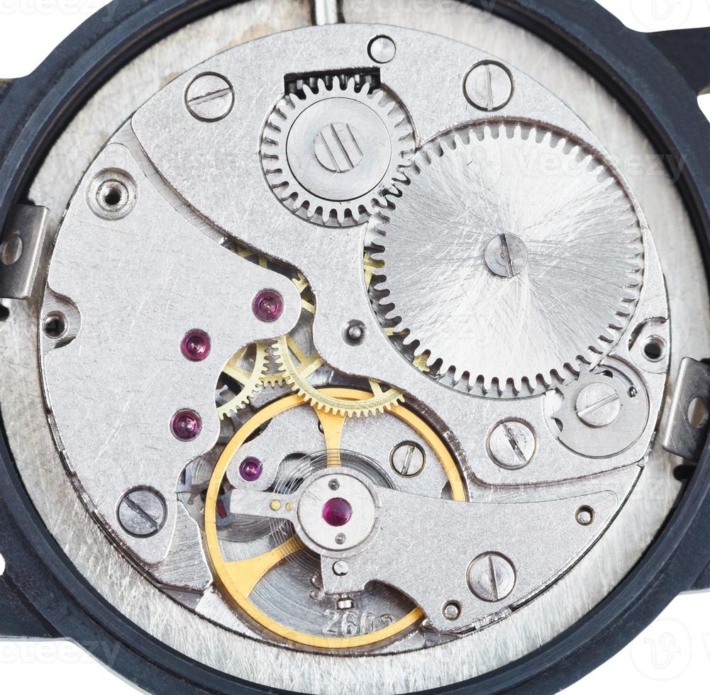 round mechanic movement of old watch photo