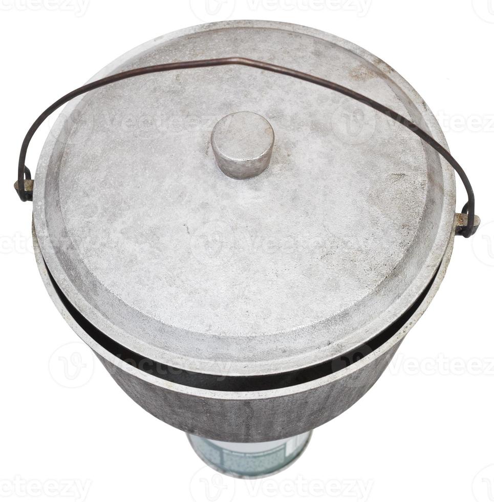 top view of camping sooty pot on gas burner photo