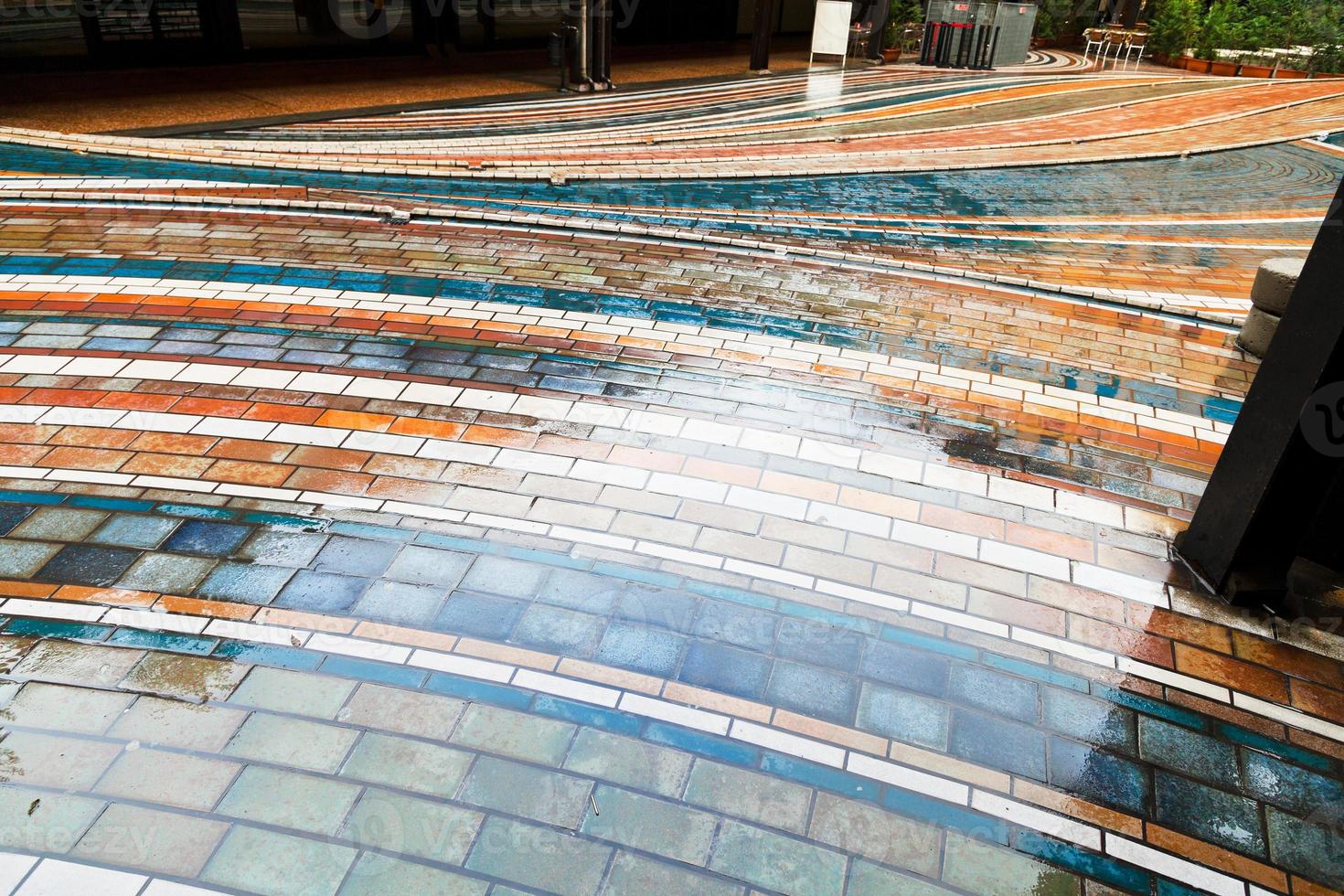 wet pied brick pavement square photo