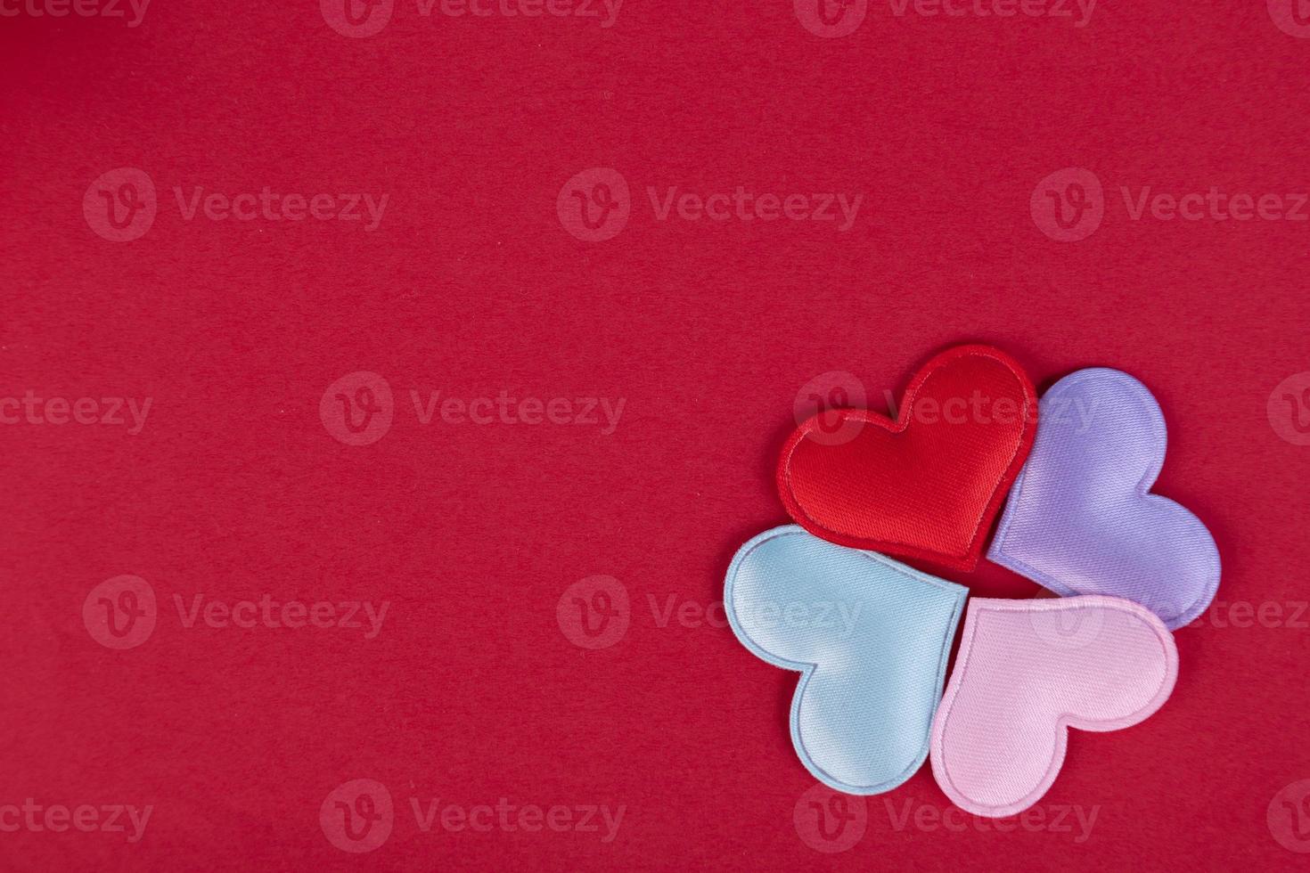 Valentines day composition. Hearts on red background. Top view. Flat lay. Copy space photo