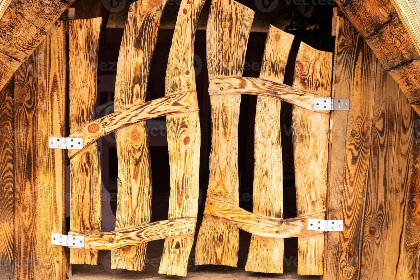 Wooden fairy door. beautiful natural background. door as a decorative element. fairy house. close-up, place for text. photo
