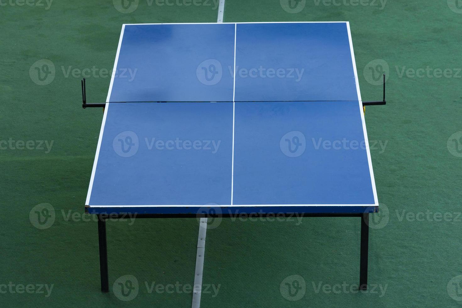 Open tennis table blue for ping-pong without a net. photo