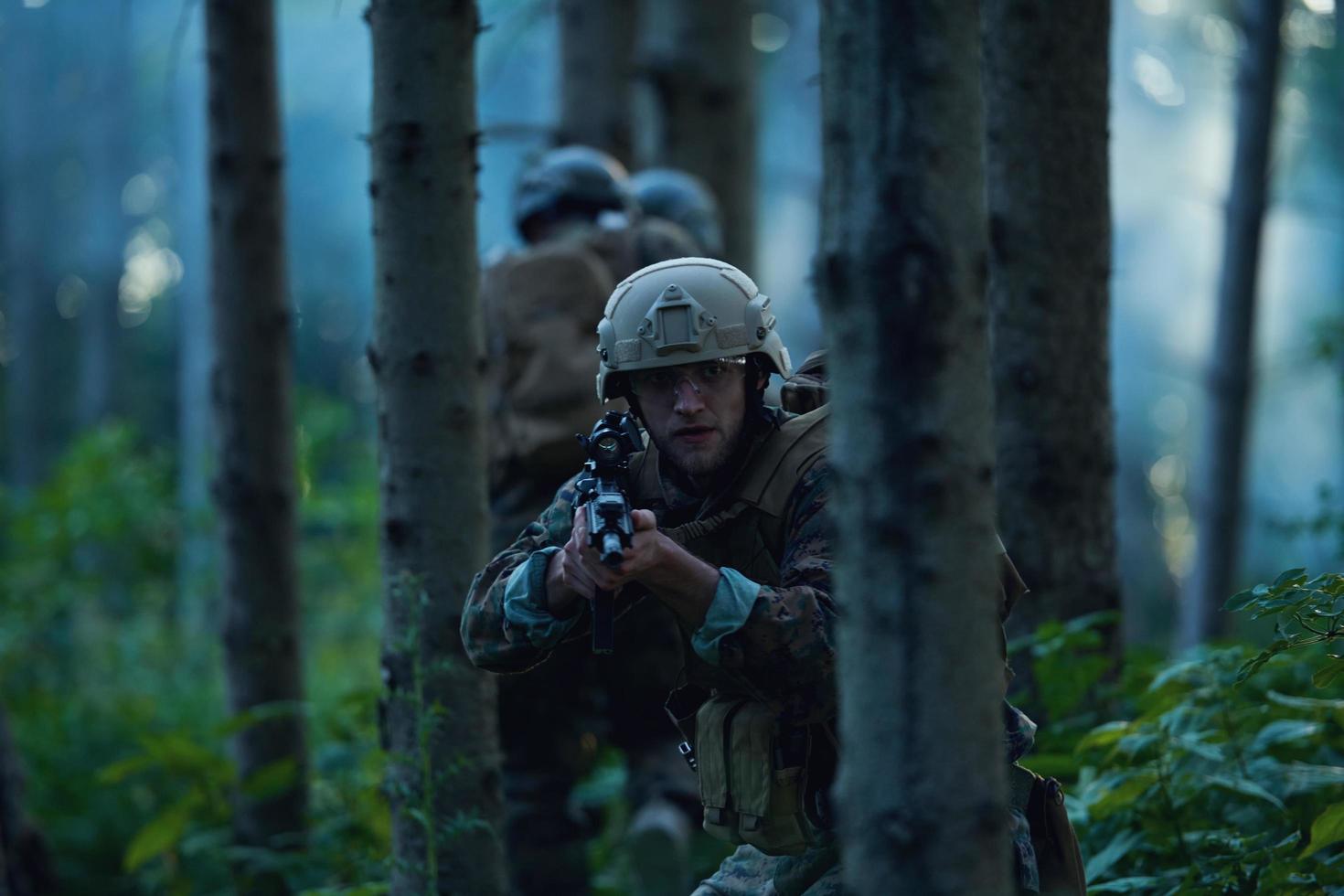 Modern warfare Soldiers  Squad  in battle photo