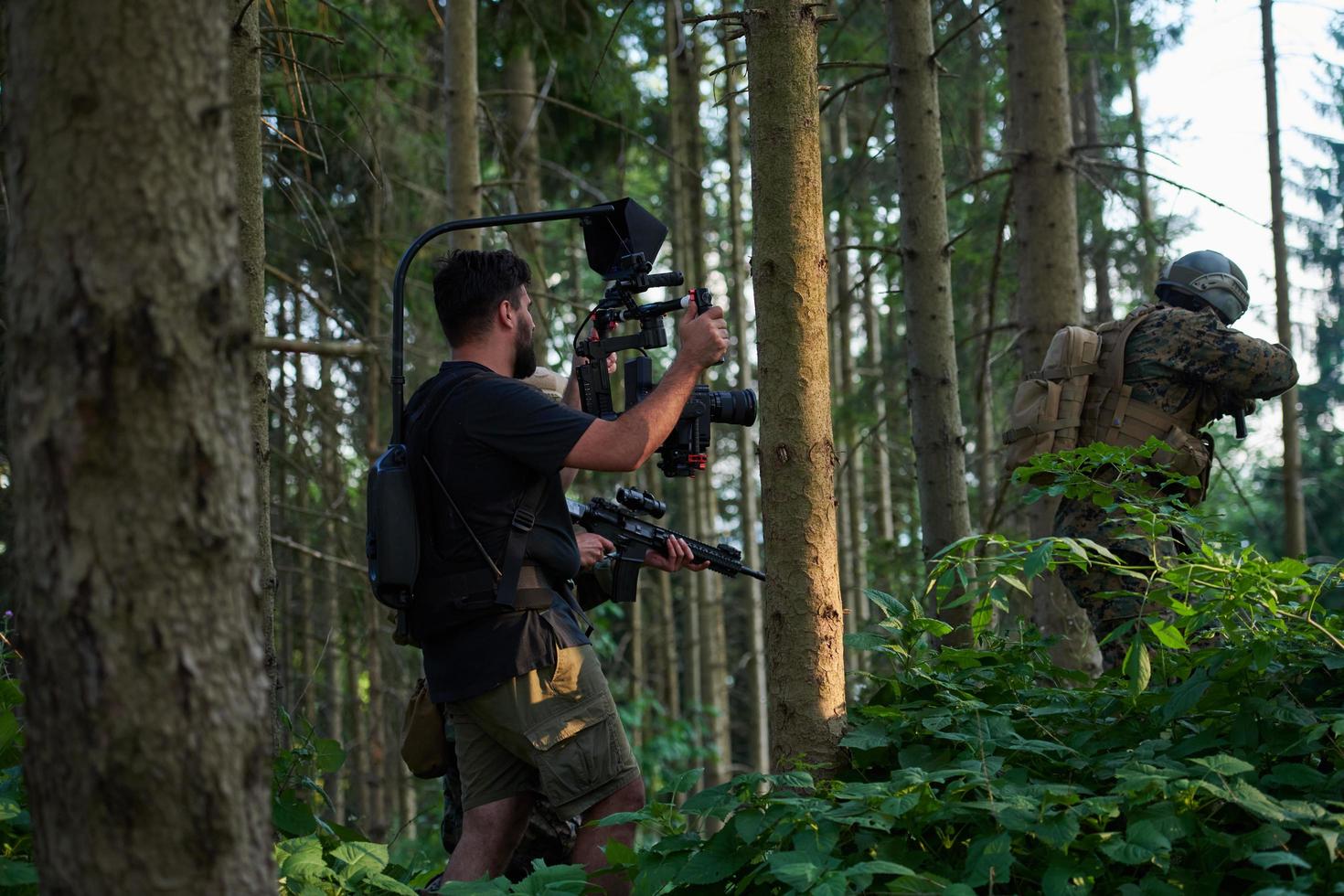 Videographer Taking Action Shoot of Soldiers in Action photo