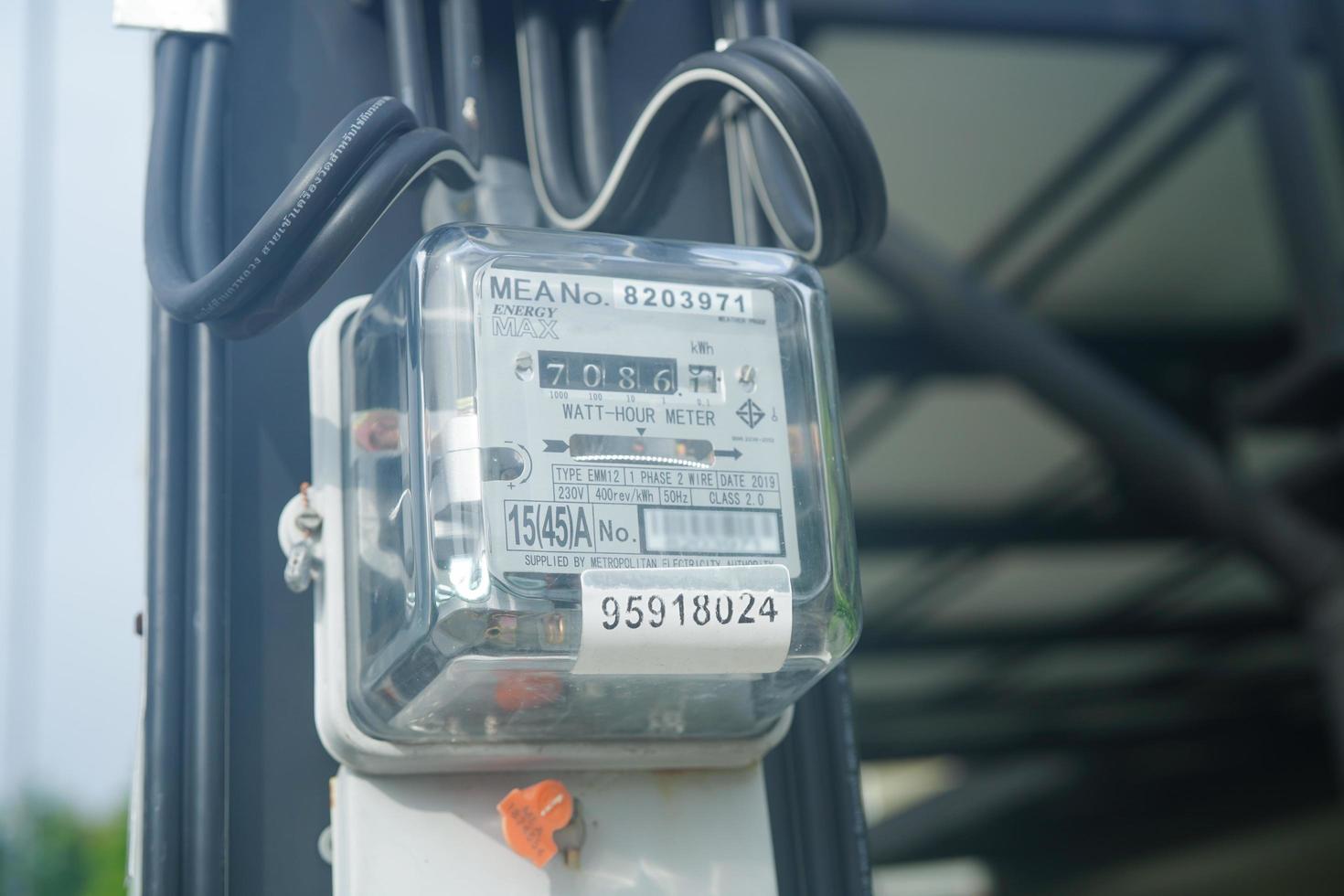 Bangkok, Thailand - May 15, 2022 Electric measuring power meter for energy cost at home and office. photo