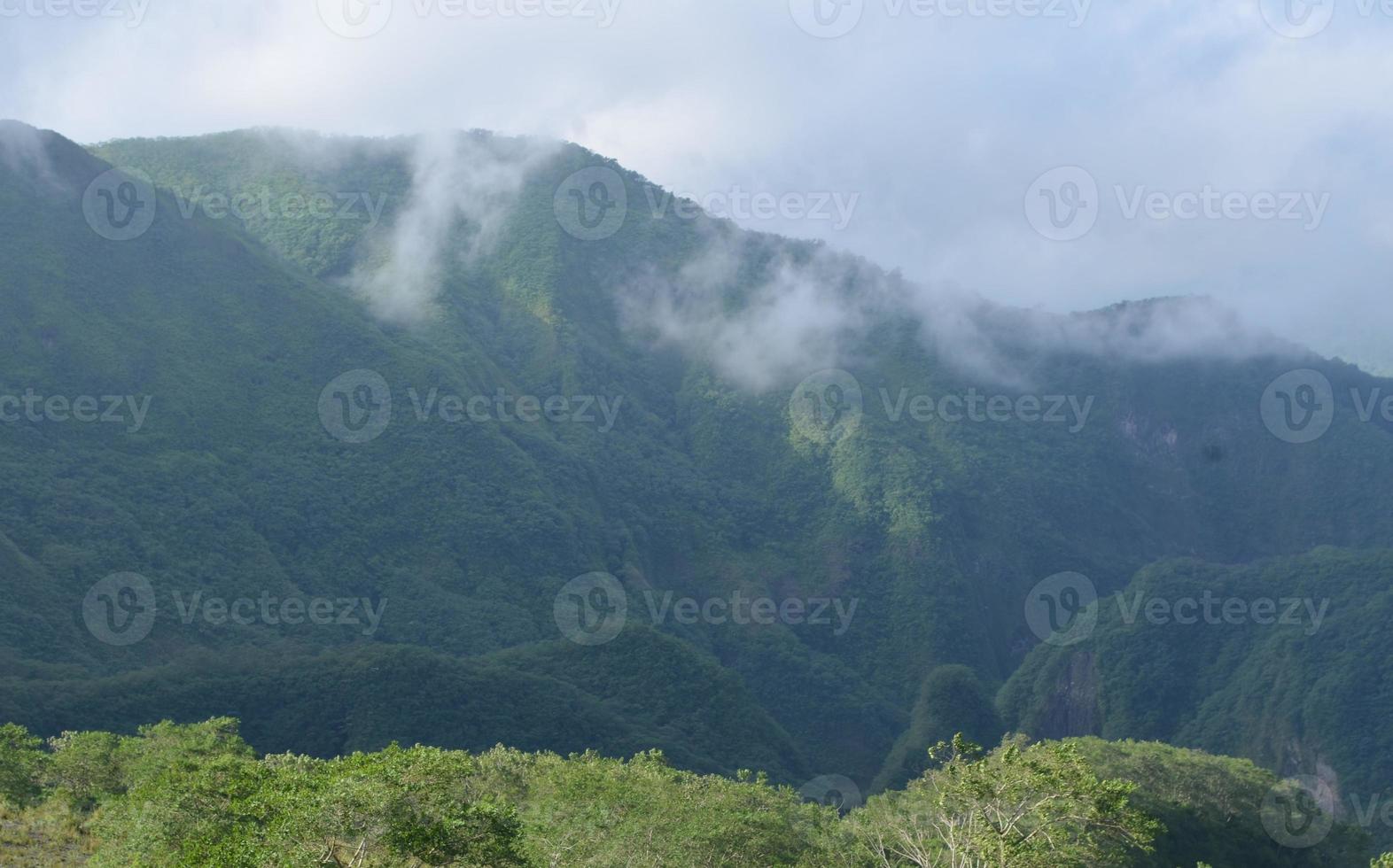 Mountain view with foggy sky photo