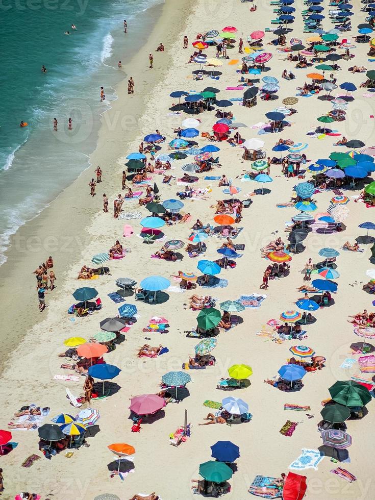 tourists on the beach in tropea photo