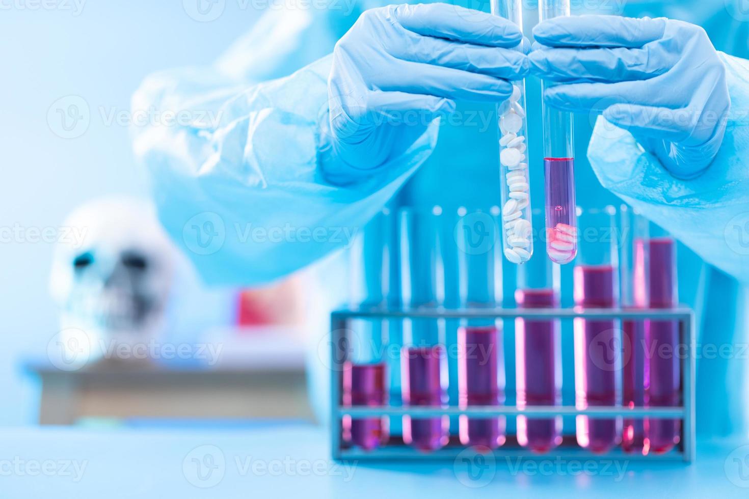 Lab assistant uniform with mask gloves holding test tube with science