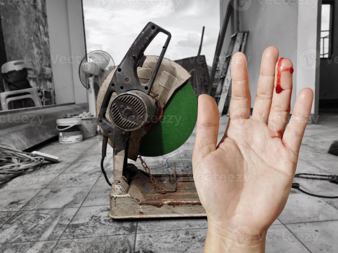 hand bleeding from the wound Accident from electric fiber cutting machine accident concept photo