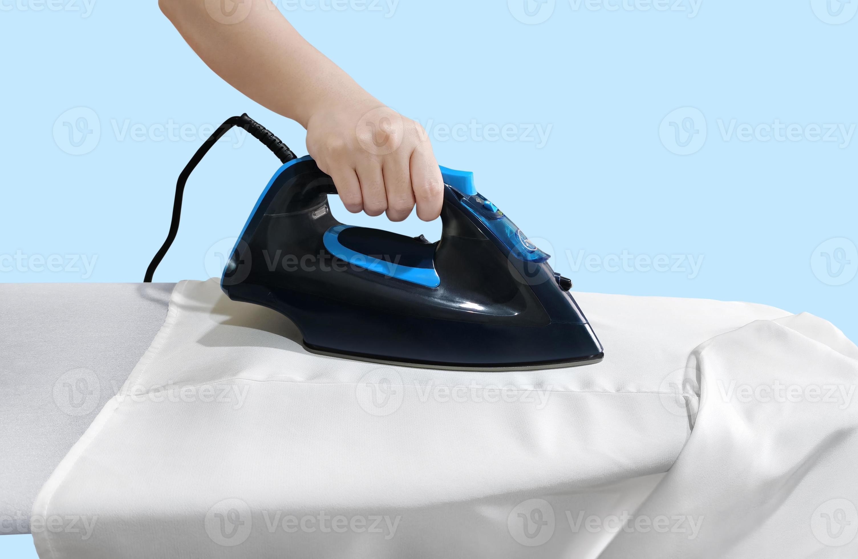 woman ironing clothes front view lonely on a blue background blue iron