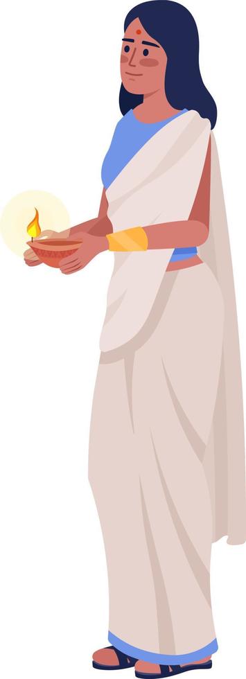 Woman in sari with burning diya semi flat color vector character. Editable figure. Full body person on white. Diwali celebration simple cartoon style illustration for web graphic design and animation