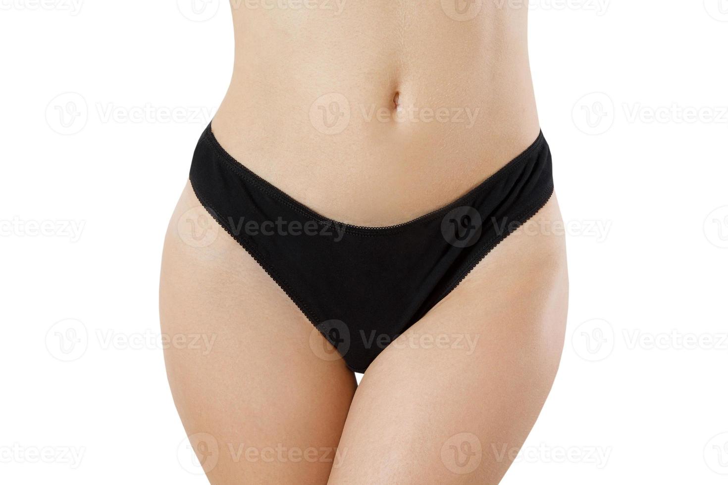 Blank Template Black Women Panties Front view mock up. Woman flat belly and good nutrition. Bikini anderwear with shave line and perfect skin. Cropped image. Body care and healthcare. Spa, copy space photo