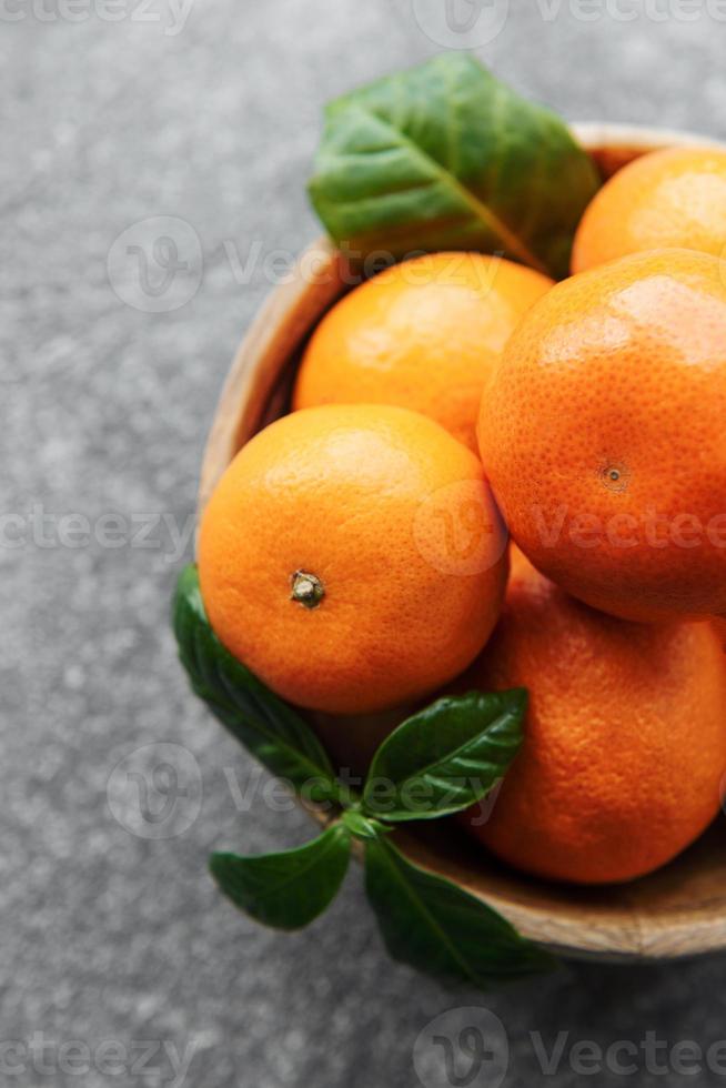Fresh citrus fruits tangerines, oranges photo