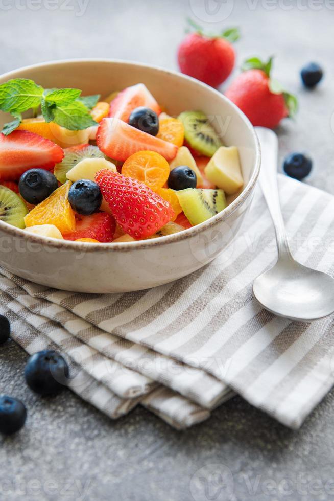 Healthy fresh fruit salad in a bowl photo