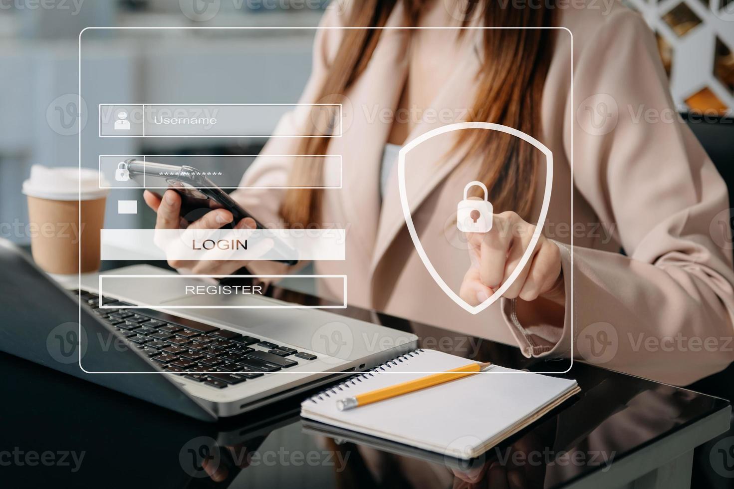 Cyber security concept, Login, User, identification information security and encryption, secure access to user's personal information woman using smart phone and tablet in office photo