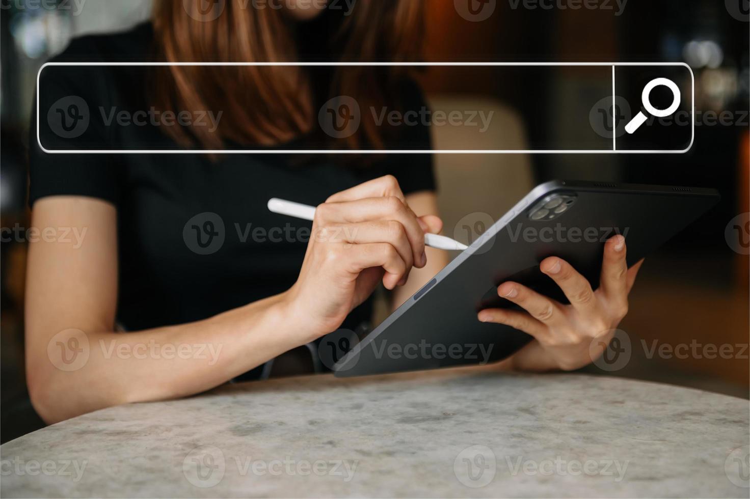Searching Browsing Internet Data Information Networking Concept with blank search bar.man working with mobile phone and laptop computer VR icon in office photo