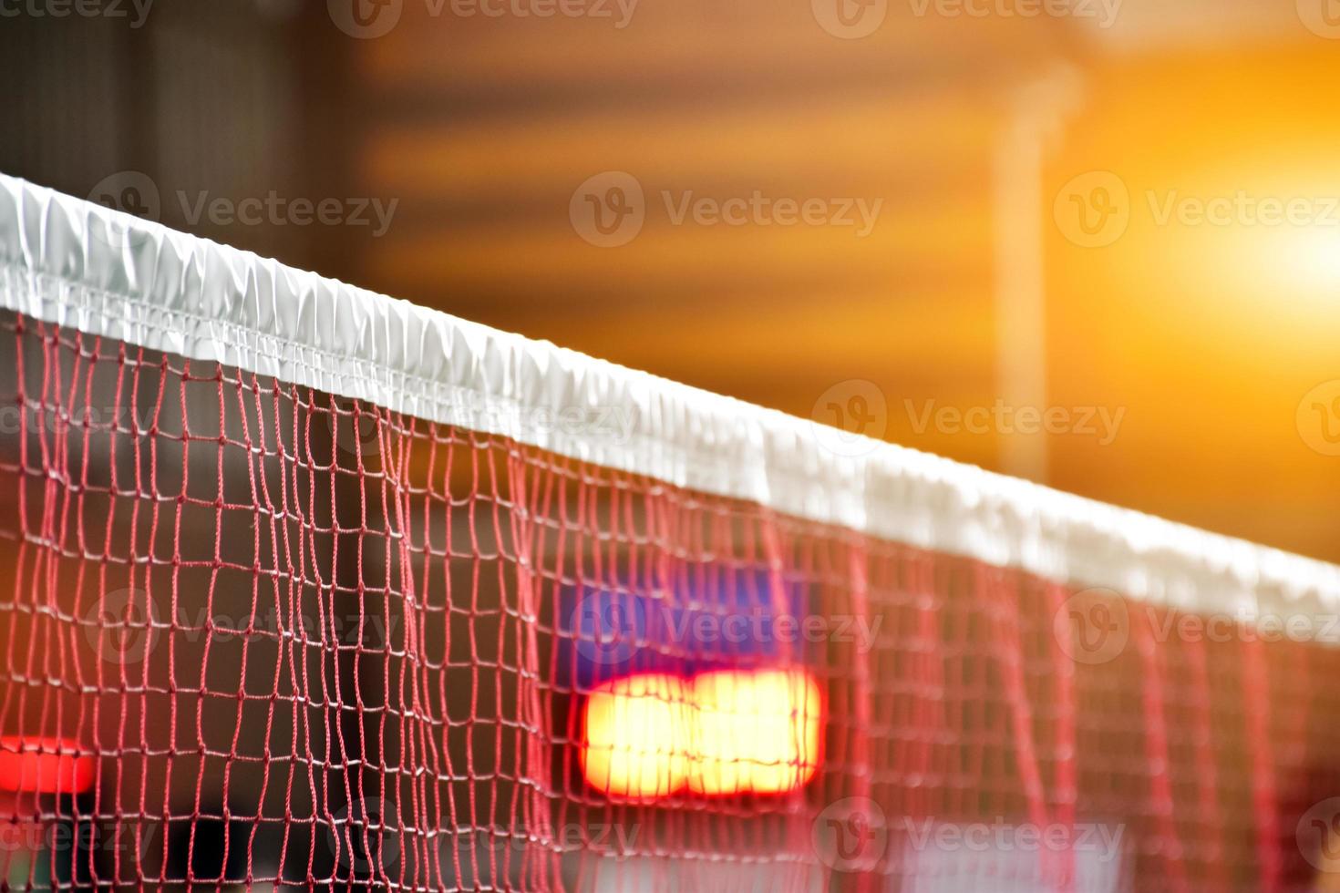 Badminton net in indoor badminton court, Soft and selective focus on net. photo