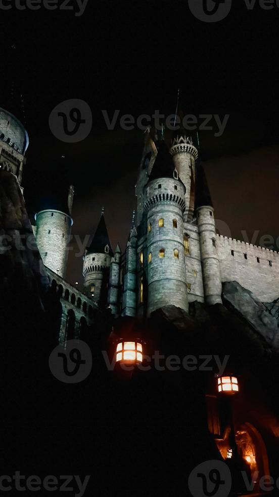 Osaka, Japan on July 8, 2019. A very beautiful light show at night at Hogwarts Castle that you must and must see when you visit Universal Studios Japan. photo